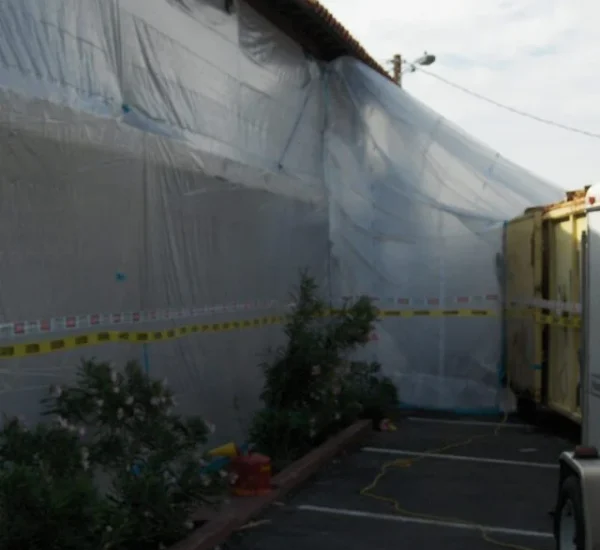 Containment-at-Motel-scaled-p0gydc7q0e5d3qamjzow9x78w8u1nlgqbps6lbjnds